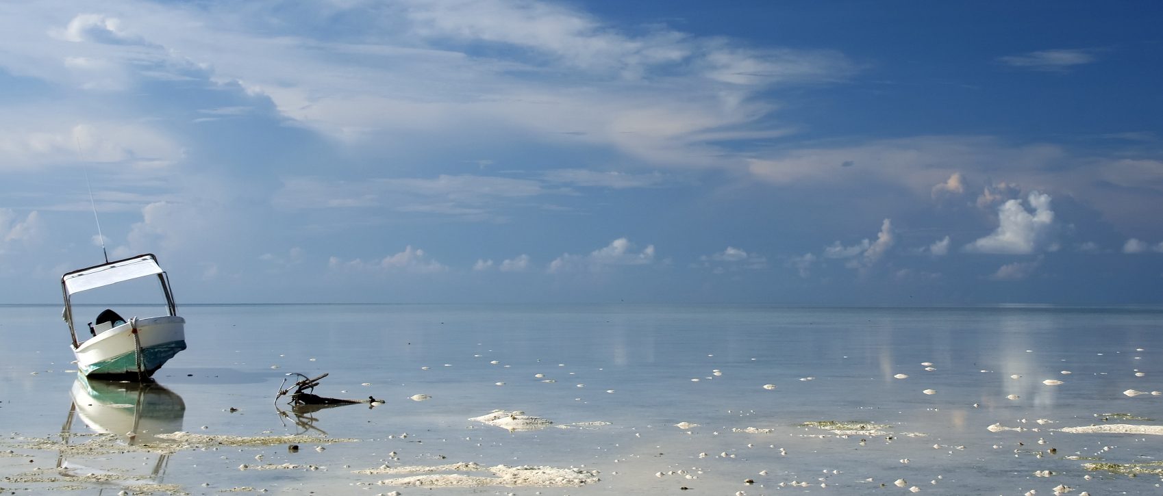 Meer und das Boot symbolisieren Grenzen setzen, eigene Bedürfnisse wahrnehmen